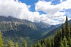 A sweeping southward vista unfolds up the glaciated U-shaped trough of the Lostine River Valley from an opening along the upper switchbacks of the Maxwell Lake Trail at 6,840 ft.